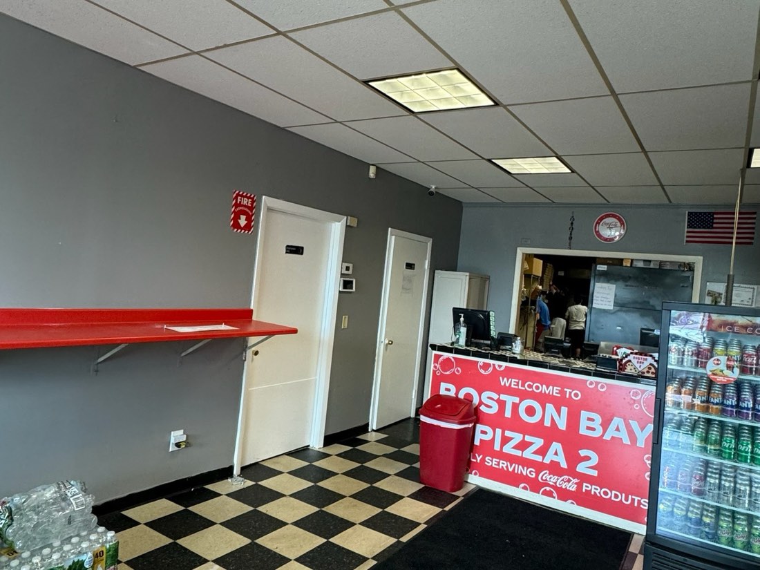 Commercial dining room repainted in grey and red